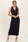woman wearing a navy ribbed sleeveless maxi dress with a collar and a scouted hem