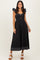 woman wearing a black midi dress with flared sleeves and a cut-out detail at the waist
