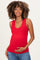 woman wearing a red ribbed maternity tank top and holding her baby bump