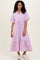 woman wearing a pink and white striped button-up midi dress with short sleeves and a drawstring waist