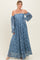 woman wearing a powder blue off-the-shoulder lace maxi dress with long balloon sleeves