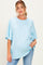 woman wearing a light blue oversized maternity t-shirt with short sleeves and a relaxed fit, showing her baby bump