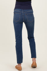 woman wearing dark blue maternity jeans with a stretchy waistband, viewed from the back