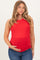 woman wearing a red ribbed maternity tank top and holding her baby bump