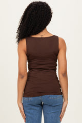 woman wearing a brown fitted tank top with a scoop neck and gathered detailing, viewed from the back
