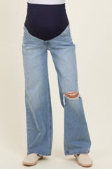 woman wearing light blue maternity wide-leg distressed jeans with a high waist panel