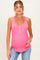 woman wearing a bright pink ribbed maternity tank top with button details and a visible baby bump
