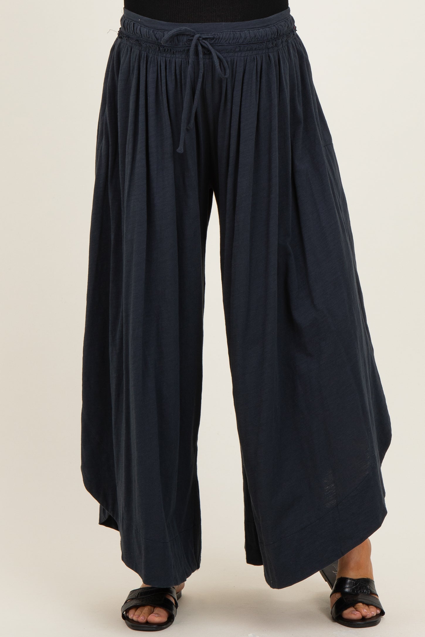 maternity wear dark navy wide-leg pants with an elastic waistband and side pockets