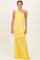 woman wearing a yellow one-shoulder ruched formal dress with a flowing skirt