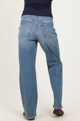 woman wearing blue maternity jeans, showing the back view with a relaxed fit and five-pocket style