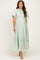 woman wearing a light green maternity maxi dress with short ruffled sleeves and a tie waist detail