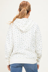 woman wearing a white floral print maternity hoodie with a hoodie and soft fabric