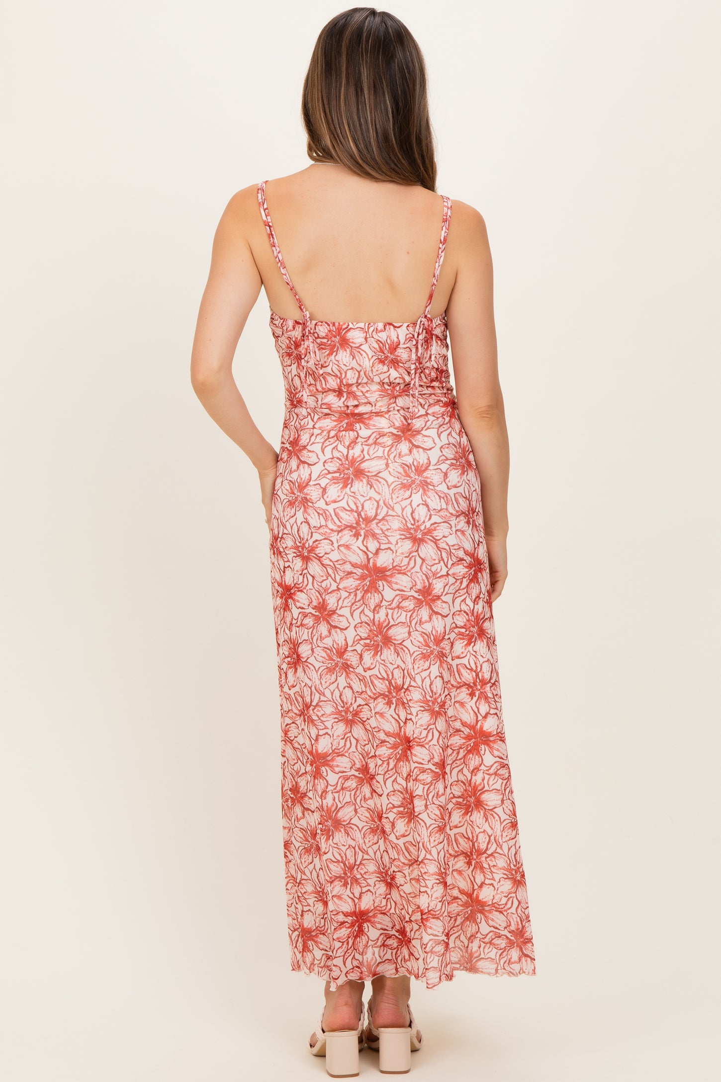 maternity wear floral maxi dress in red and white with adjustable straps and a flowy silhouette