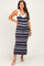 woman wearing a navy and white striped maternity maxi dress with tie shoulder straps and a visible baby bump