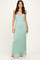 woman wearing a mint green lace maxi dress with a scoop neckline and spaghetti straps
