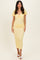 woman wearing a yellow ruched midi dress with short puff sleeves and a v-neckline