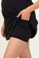 maternity wear black skort with a side pocket, styled for comfort and ease, featuring a pregnant belly visible
