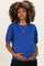 woman wearing a bright blue short sleeve maternity sweater and holding her baby bump