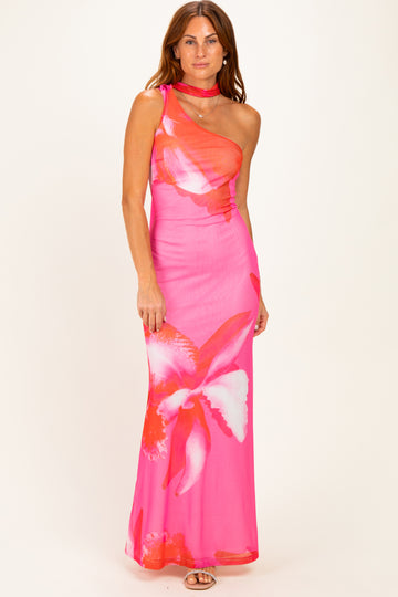 woman wearing a pink floral one-shoulder maxi dress with a fitted silhouette and choker detail