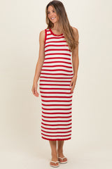 woman wearing a red and white striped maternity dress with a fitted silhouette and scalloped hem, showing her baby bump