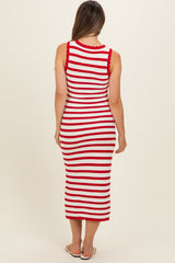 woman wearing a red and white striped maternity dress with a fitted silhouette and scalloped details