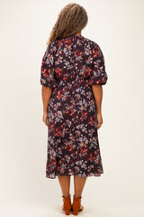 woman wearing a floral print plus size midi dress with puff sleeves and a cinched waist, shown from the back