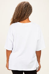 plus size woman wearing a loose-fitting white oversized t-shirt viewed from the back