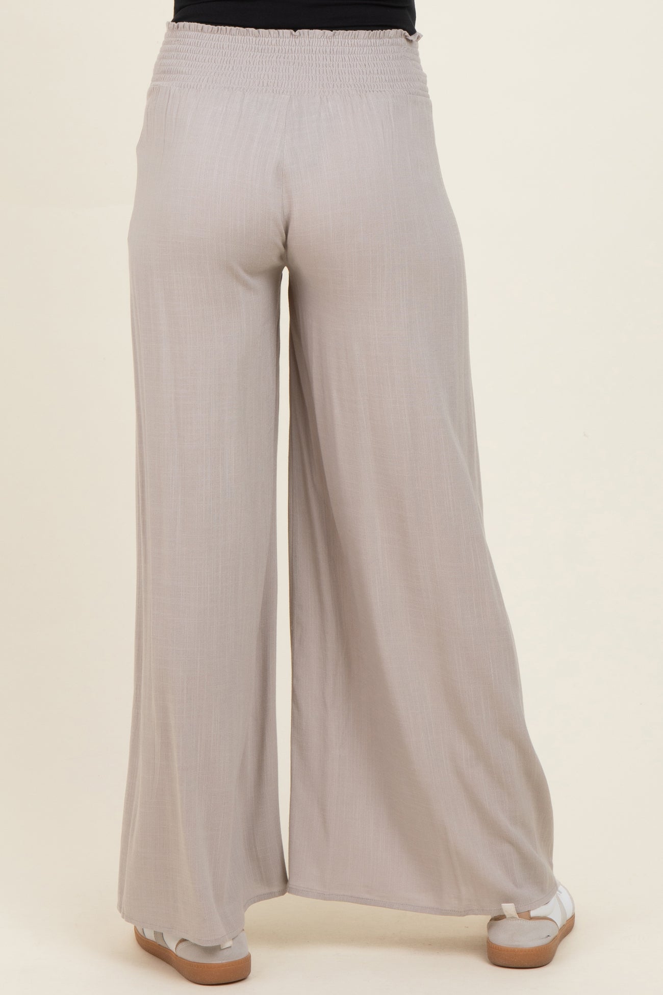 maternity wear light gray wide-leg pants with an elastic waistband, shown from the back