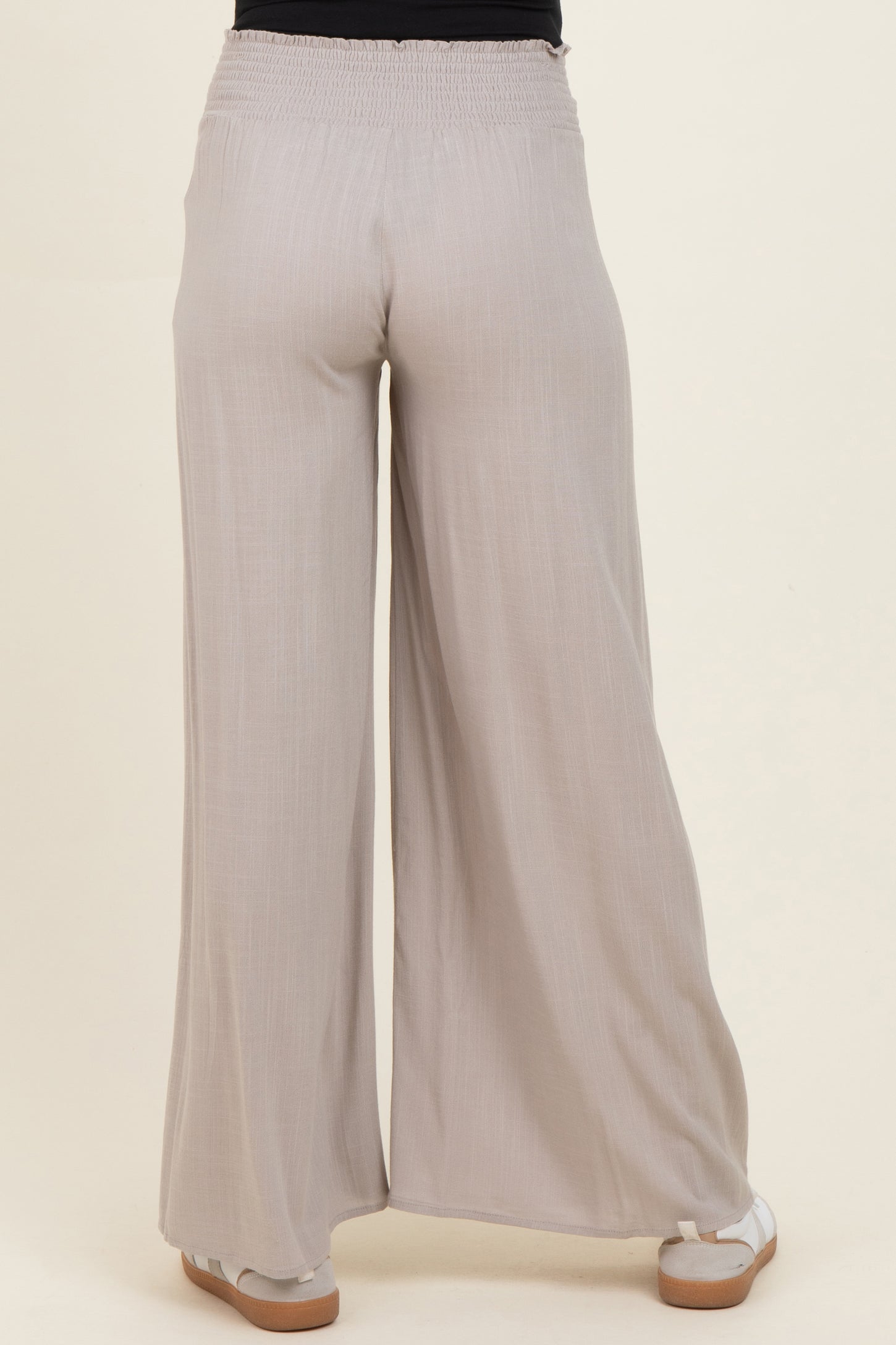 maternity wear light gray wide-leg pants with an elastic waistband, shown from the back