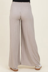 maternity wear light gray wide-leg pants with an elastic waistband, shown from the back