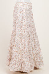 women's white floral tiered maxi skirt with buttons, shown from the side