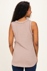 woman wearing a relaxed fit beige ribbed sleeveless maternity top, seen from the back