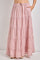 woman wearing a light pink floral tiered maxi skirt with pockets and an elastic waistband