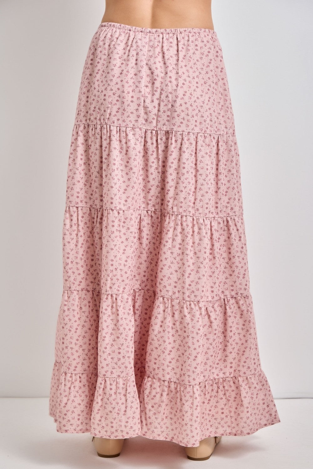 pink floral tiered maxi skirt with ruffled hem and elastic waistband