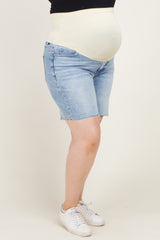woman wearing light blue maternity plus denim shorts with a supportive belly band and a visible baby bump