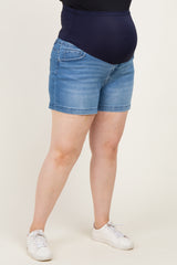 maternity wear denim shorts in light blue with a navy belly band, model showing a visible baby bump