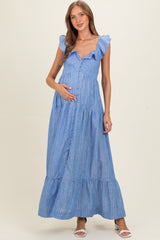 woman wearing a blue striped maxi maternity dress with ruffled sleeves and a baby bump