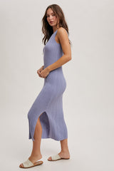 woman wearing a lavender ribbed knit maxi dress with a side slit and spaghetti straps