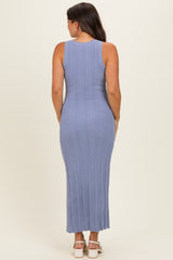 woman wearing a light blue ribbed maternity maxi dress, showing the back view