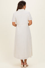 woman wearing a white striped maternity dress with short sleeves and a fitted waist, showing the back view