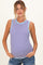 woman wearing a striped maternity tank top in purple and blue with a visible baby bump