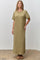 woman wearing a light olive green striped maxi dress with short sleeves and a scalloped neckline
