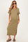 woman wearing a striped maternity maxi dress with a round neckline and side split, styled with sunglasses and sandals