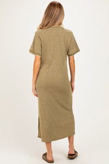 woman wearing a brown and yellow striped maternity maxi dress with short sleeves and side slits, viewed from the back
