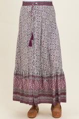 maternity wear long purple and white patterned skirt with a drawstring waist and tassel detail, model not shown