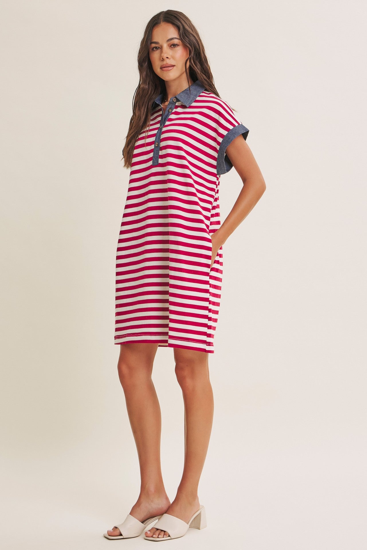woman wearing a red and white striped polo dress with denim collar and short sleeves