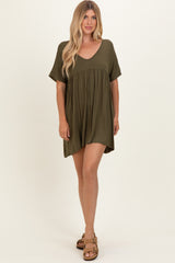 woman wearing an olive green short sleeve casual dress with a v-neck and loose fit