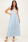 woman wearing a floral and striped maxi dress with tie shoulder straps and a relaxed fit