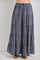 woman wearing a navy and white gingham tiered maxi skirt with a drawstring waist and flared hem