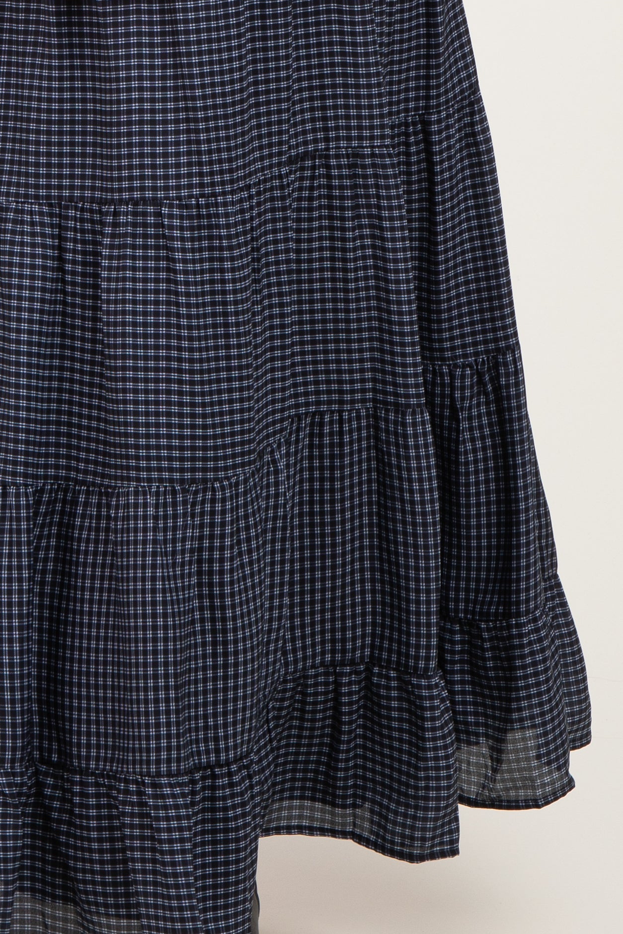 maternity wear navy blue gingham tiered dress with ruffle sleeves and hem